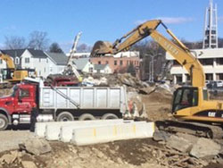 A. Vitti dump truck and excavator on a job site